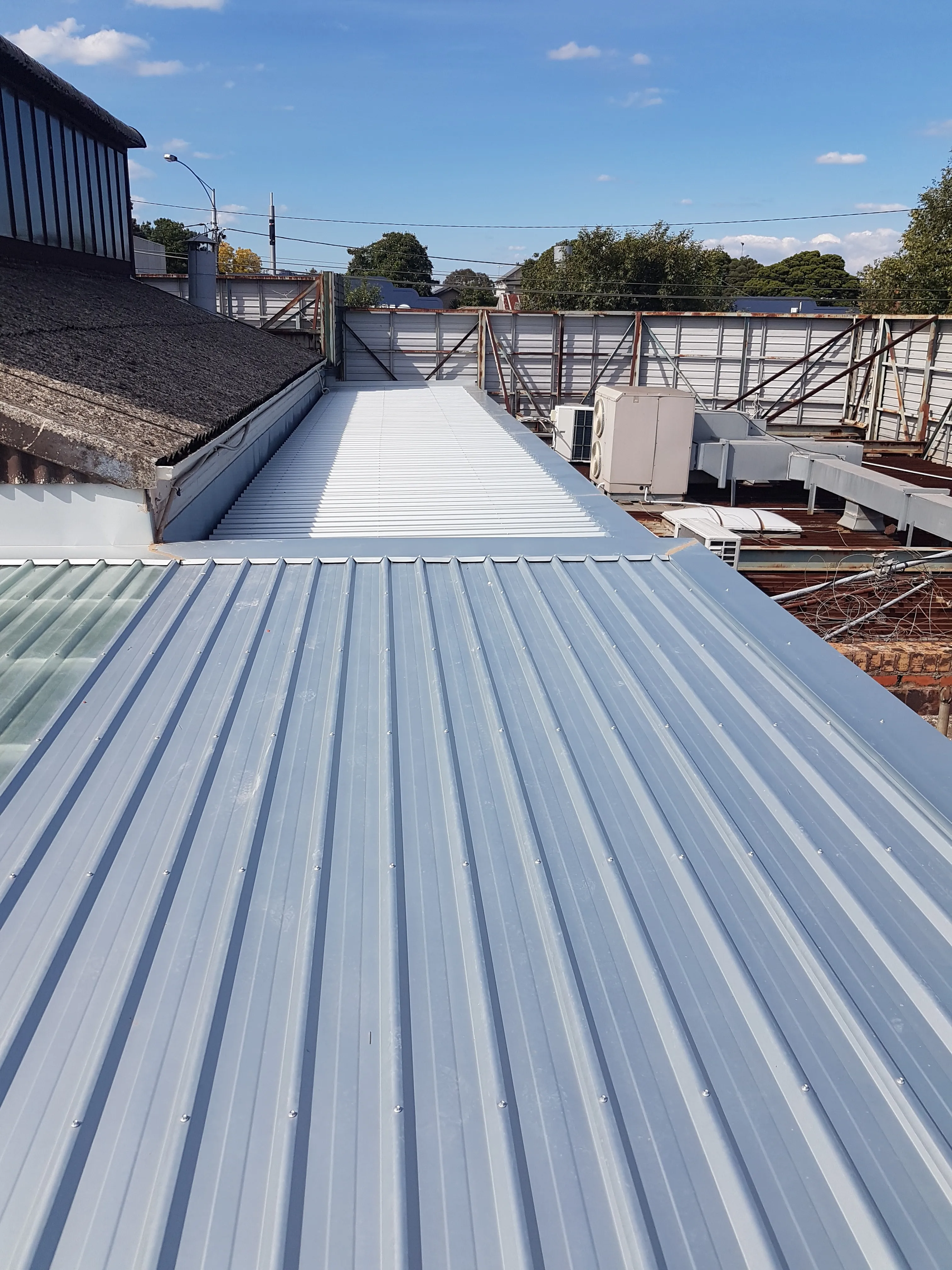 Commercial Colorbond re-roof completed by Cascone Roofing in Melbourne