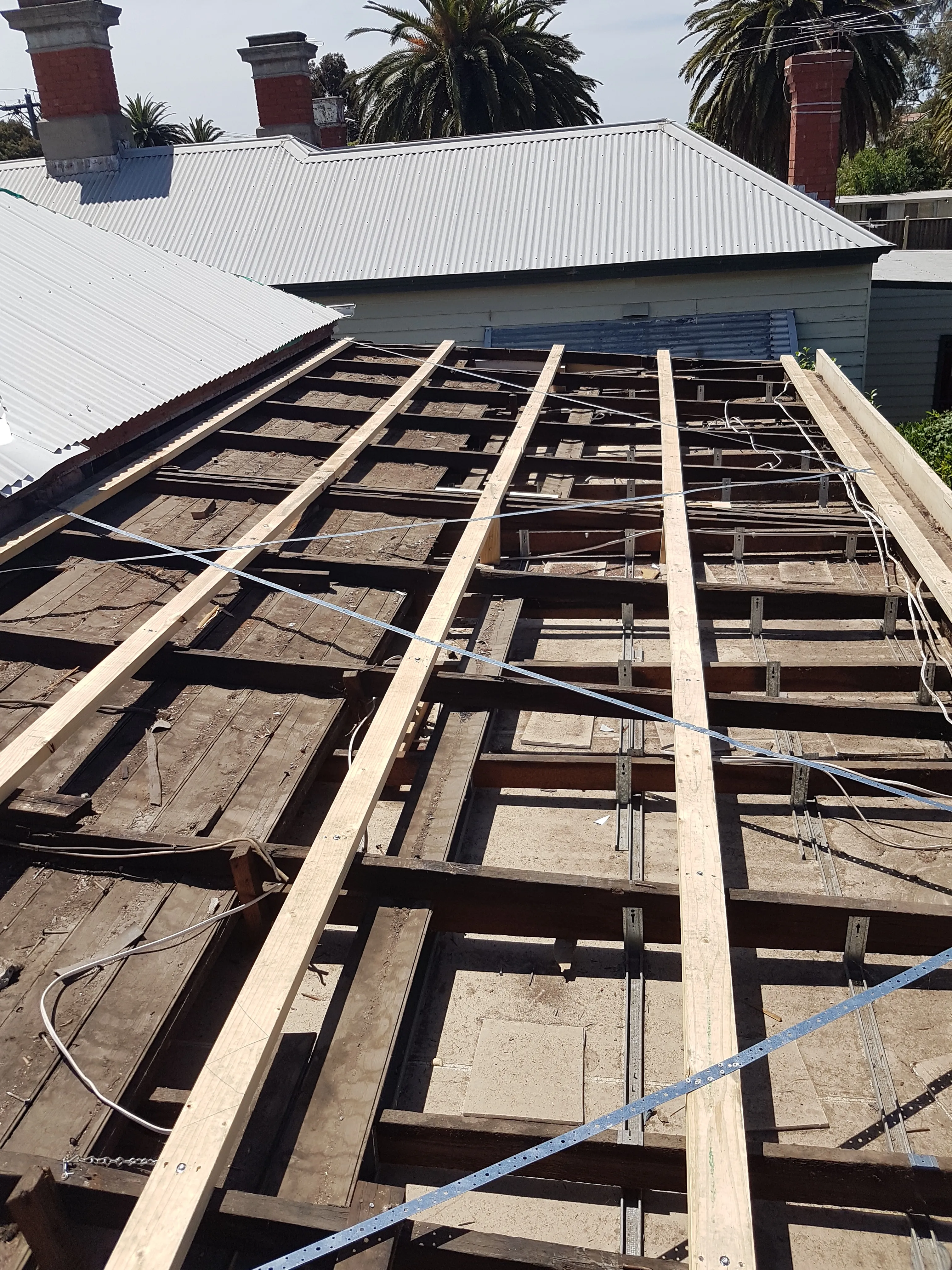 Before and after re-roof — Thornbury