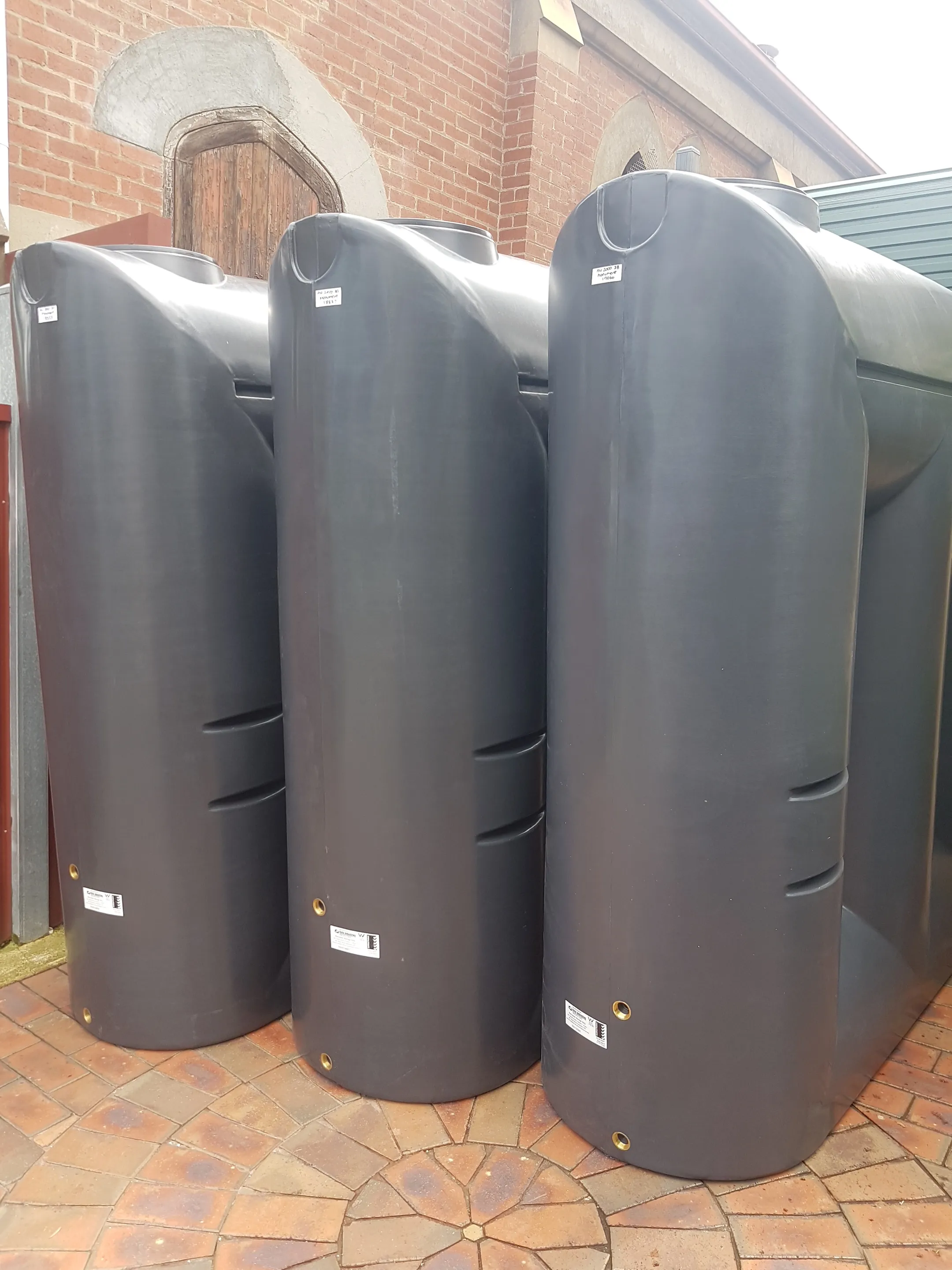 Rainwater Tanks Ready For Delivery Melbourne — Cascone Roofing