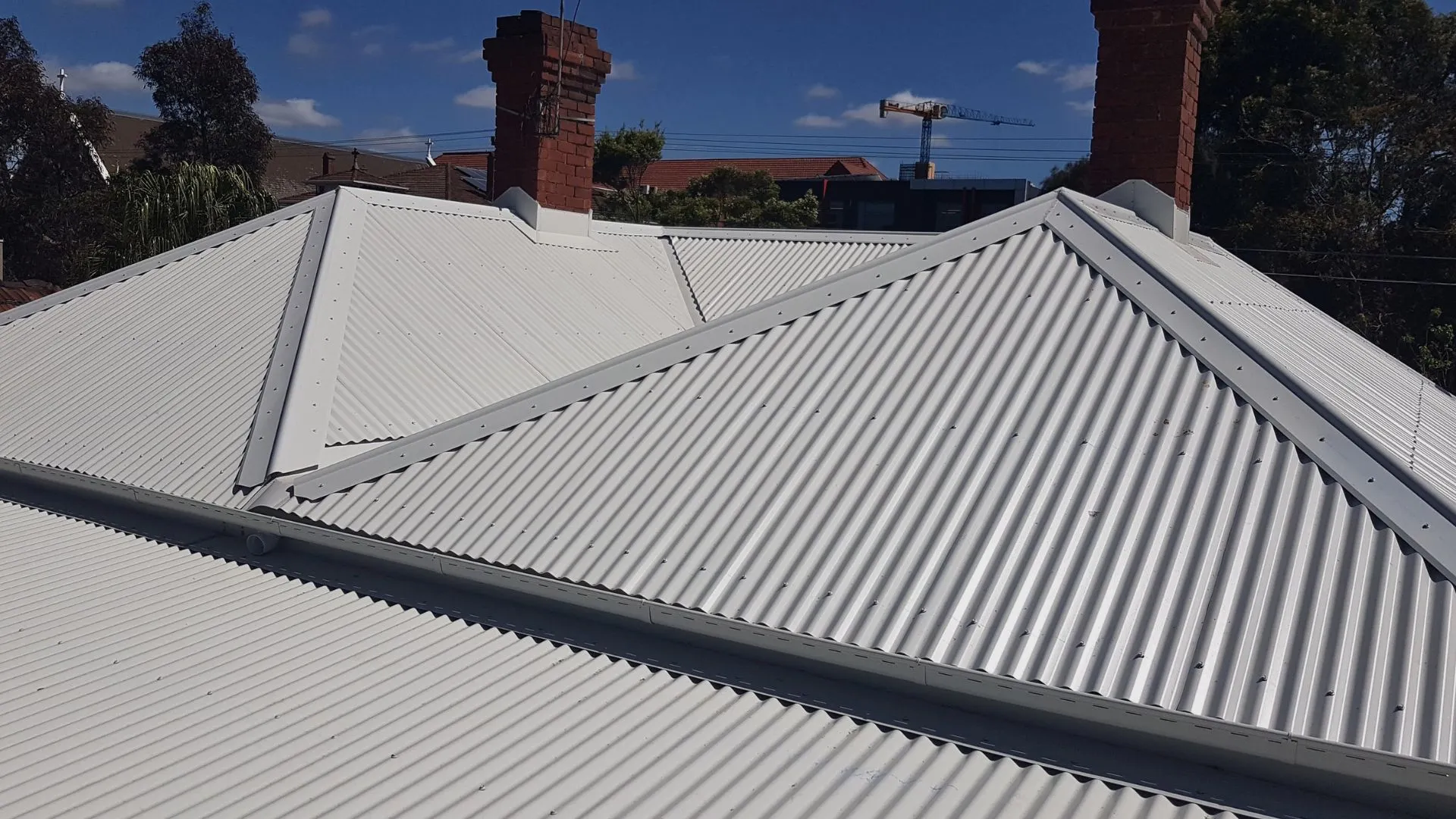 Cascone Roofing team completing a Colorbond re-roof in Melbourne