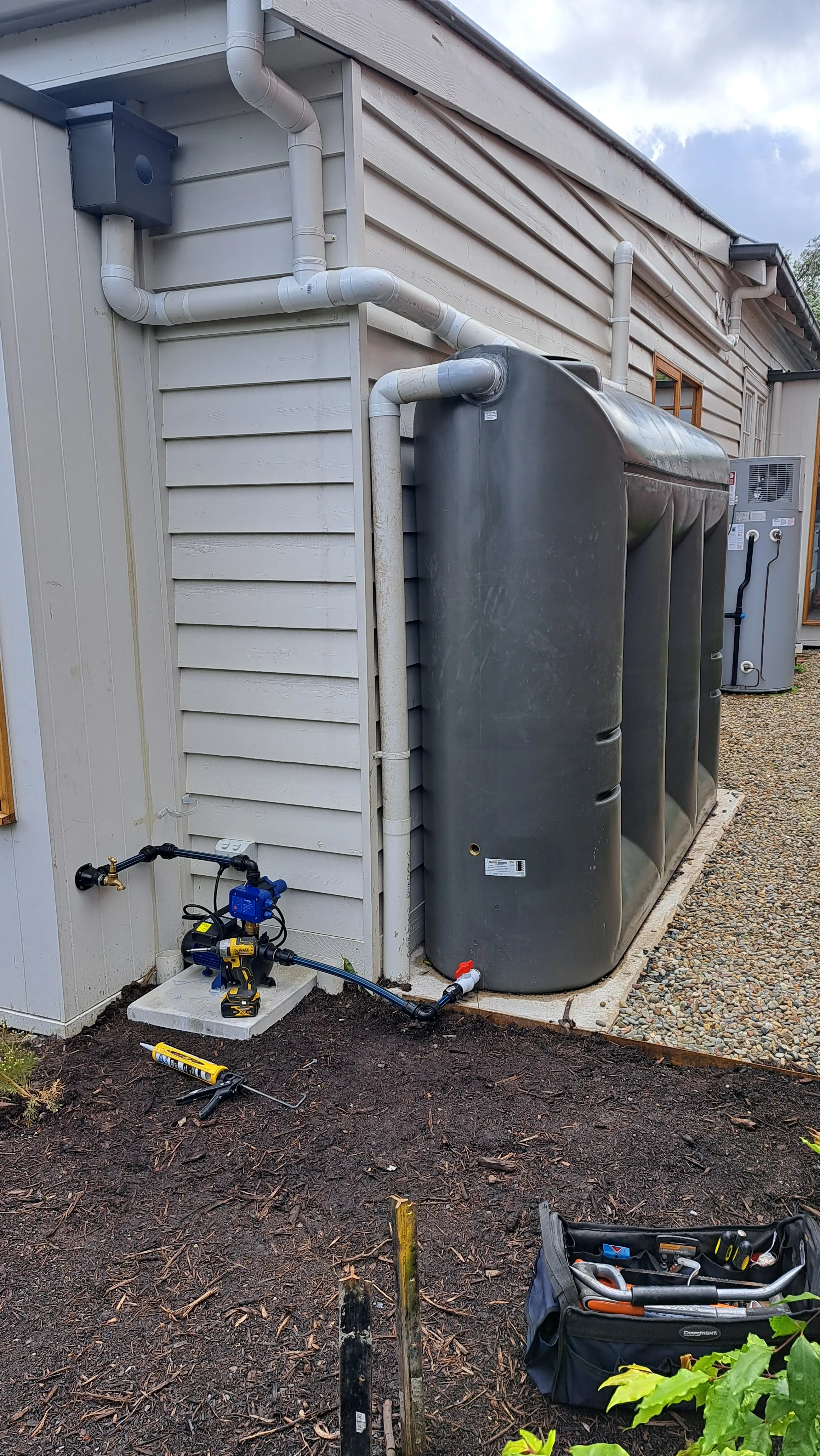 Slim Line Rainwater Tank Installation Northcote Completed — Cascone Roofing